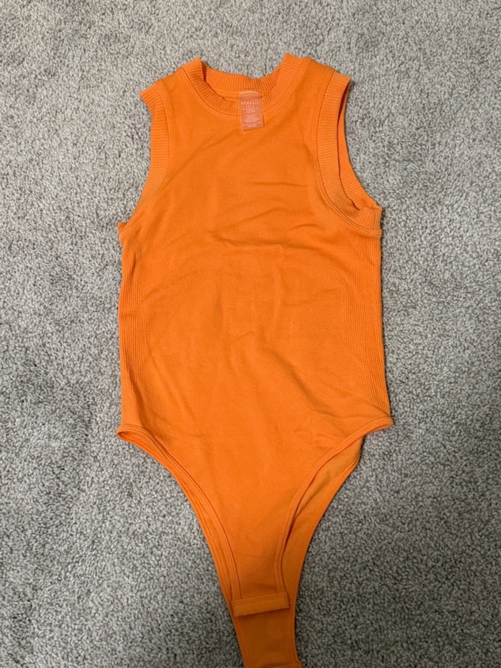 Dynamic Sleeveless Ribbed Bodysuit in Bright Orange one size